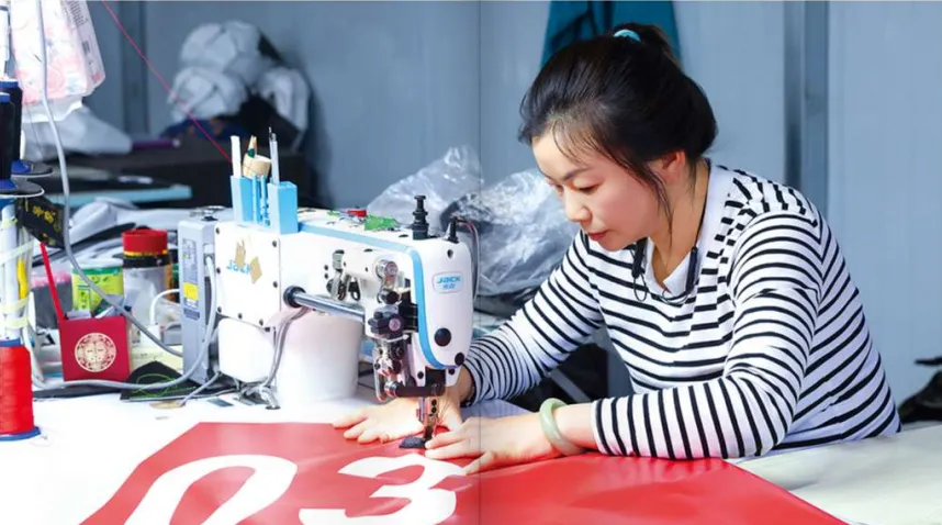Sewing line producing printed training bags